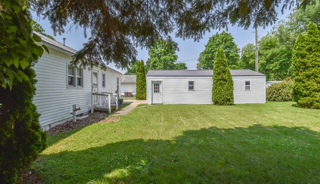 402 Division St, Union City, MI 49094 - view of green lawn with an outbuilding