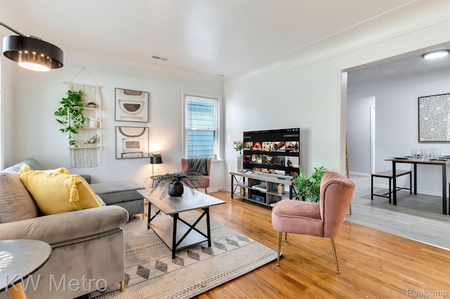 19391 Inkster Rd, Livonia, MI 48152 - living room with wood finished floors