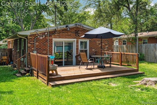 3341 Creek Dr, Ann Arbor, MI 48108 - rear view of house with brick siding and a deck