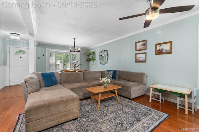 3341 Creek Dr, Ann Arbor, MI 48108 - living room featuring ornamental molding, wood finished floors, a chandelier, a ceiling fan, and a textured ceiling