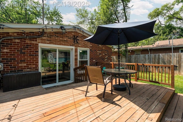 3341 Creek Dr, Ann Arbor, MI 48108 - wooden deck with outdoor dining area