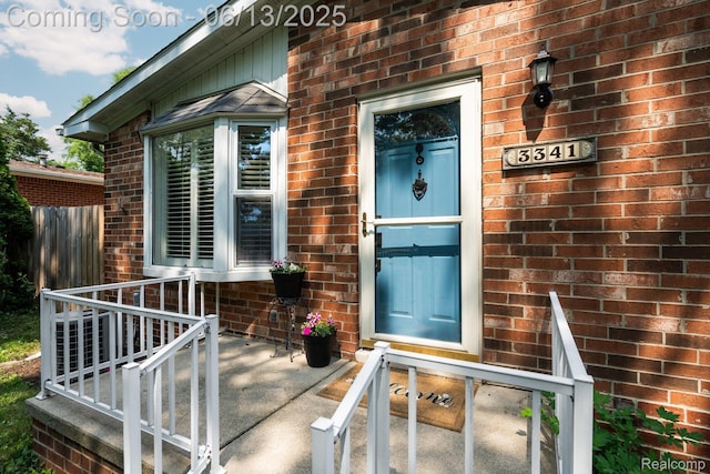 3341 Creek Dr, Ann Arbor, MI 48108 - view of exterior entry featuring brick siding