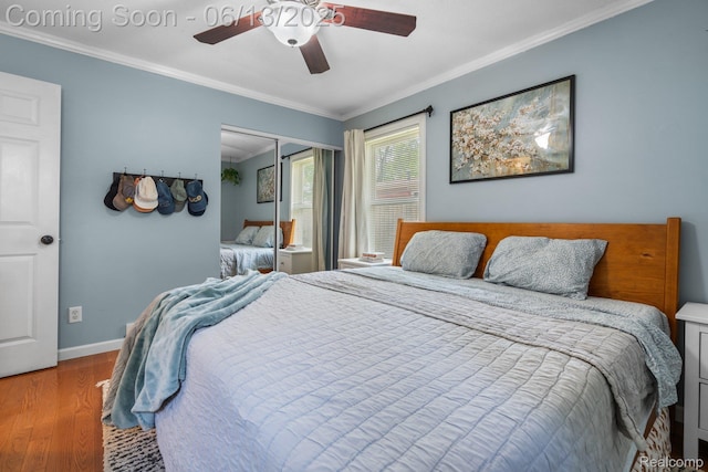 3341 Creek Dr, Ann Arbor, MI 48108 - bedroom with wood finished floors, crown molding, and a ceiling fan