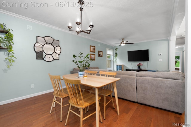 3341 Creek Dr, Ann Arbor, MI 48108 - dining space featuring ornamental molding, wood finished floors, ceiling fan, and a chandelier