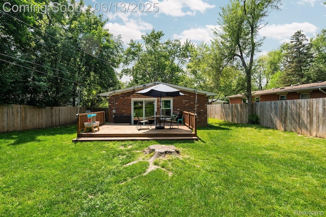 3341 Creek Dr, Ann Arbor, MI 48108 - back of house with a fenced backyard, a wooden deck, and brick siding