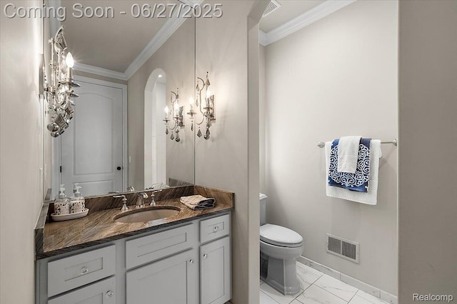 3610 Piccadilly Dr, Rochester Hills, MI 48309 - bathroom featuring marble look tile flooring, vanity, and crown molding