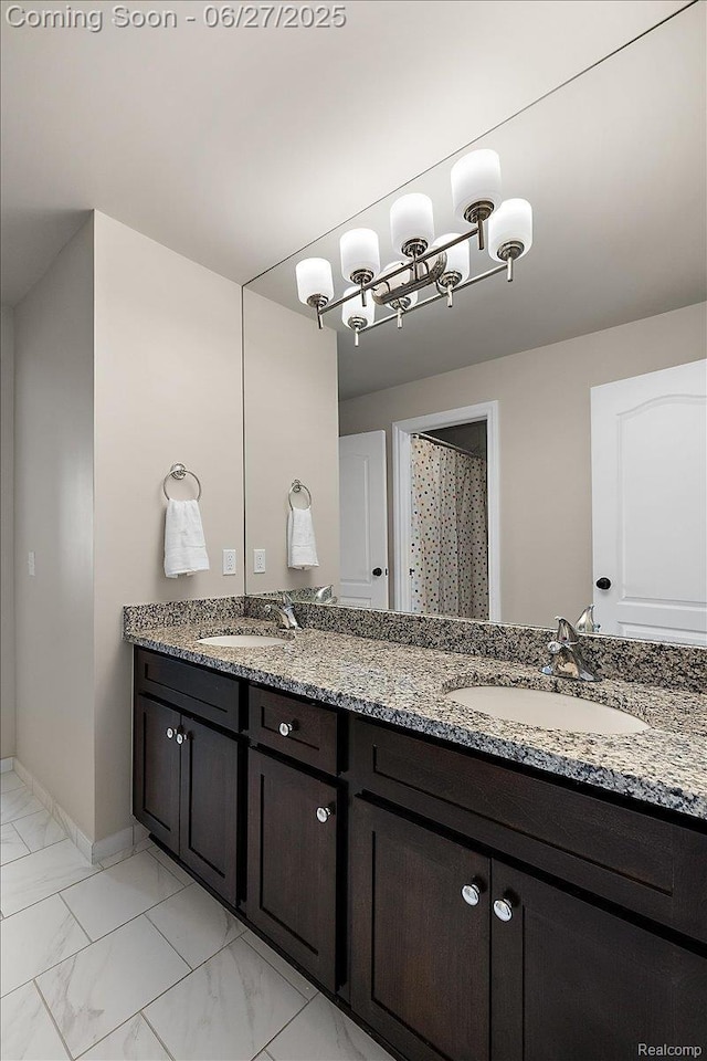 3610 Piccadilly Dr, Rochester Hills, MI 48309 - bathroom with double vanity and marble look tile flooring