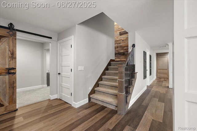 3610 Piccadilly Dr, Rochester Hills, MI 48309 - stairs featuring wood finished floors and a barn door