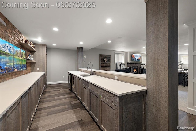 3610 Piccadilly Dr, Rochester Hills, MI 48309 - kitchen featuring light countertops, dark wood finished floors, recessed lighting, open shelves, and dark brown cabinetry