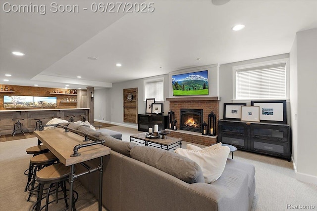 3610 Piccadilly Dr, Rochester Hills, MI 48309 - living area featuring bar area, recessed lighting, and a brick fireplace