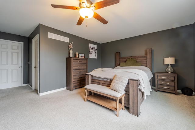 32822 Ravine St, New Haven, MI 48048 - bedroom with light carpet, baseboards, and ceiling fan