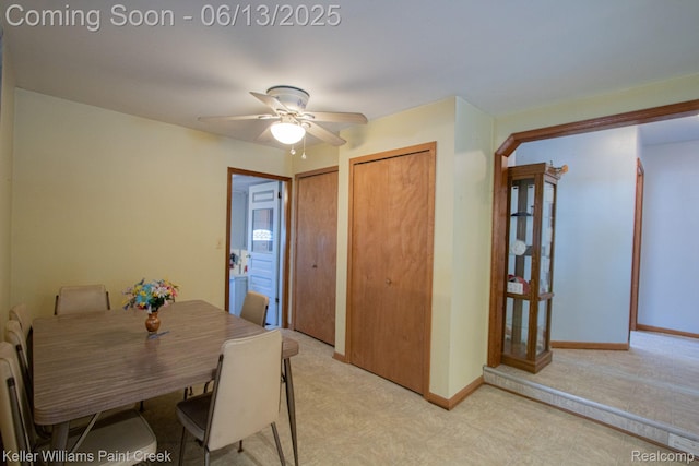 525 E Saint Clair St, Almont, MI 48003 - dining room featuring ceiling fan and baseboards