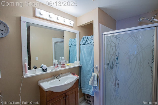 525 E Saint Clair St, Almont, MI 48003 - bathroom featuring vanity and a shower stall