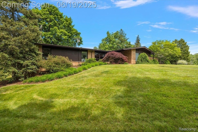 2732 Lone Pine Rd, West Bloomfield, MI 48323 - view of front of property featuring a front lawn and brick siding