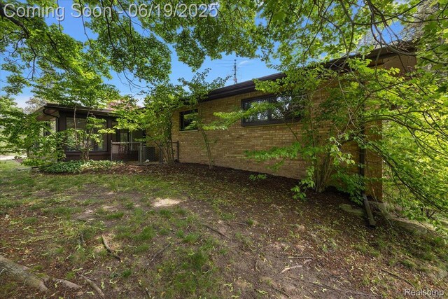 2732 Lone Pine Rd, West Bloomfield, MI 48323 - view of yard featuring a sunroom