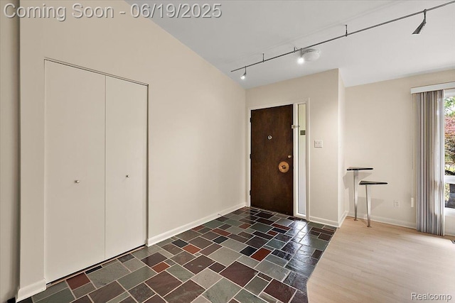 2732 Lone Pine Rd, West Bloomfield, MI 48323 - foyer entrance with baseboards and rail lighting
