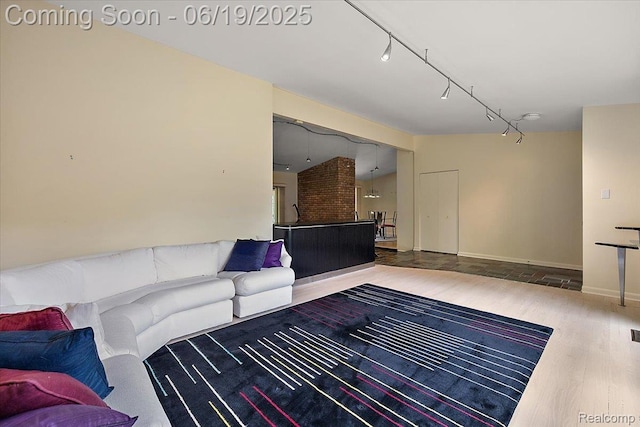 2732 Lone Pine Rd, West Bloomfield, MI 48323 - living room with wood finished floors and rail lighting
