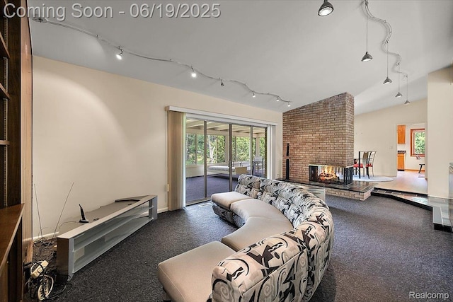 2732 Lone Pine Rd, West Bloomfield, MI 48323 - living area featuring track lighting, lofted ceiling, carpet, and a fireplace