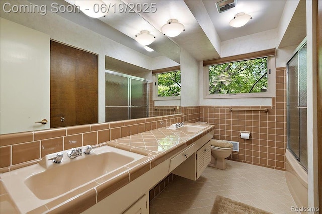 2732 Lone Pine Rd, West Bloomfield, MI 48323 - bathroom featuring tile walls, tile patterned flooring, and double vanity