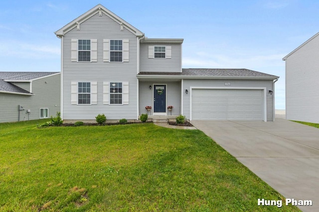 5764 Kiverton Ridge Dr SE, Grand Rapids, MI 49508 - traditional-style house featuring a garage, driveway, and a front lawn