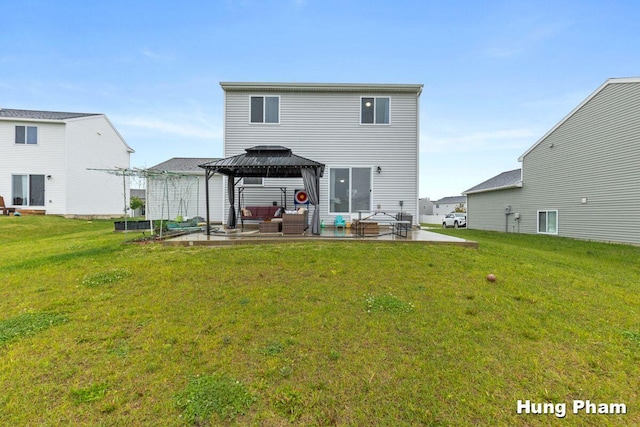 5764 Kiverton Ridge Dr SE, Grand Rapids, MI 49508 - back of house featuring a gazebo, a patio, a lawn, and an outdoor living space