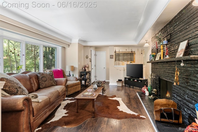 23385 Hunters Ln, Southfield, MI 48033 - living room with wood-type flooring and a brick fireplace