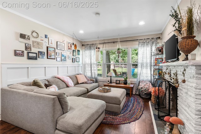 23385 Hunters Ln, Southfield, MI 48033 - living area with dark wood-style floors, ornamental molding, wainscoting, recessed lighting, and a decorative wall
