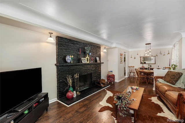 23385 Hunters Ln, Southfield, MI 48033 - living area featuring wood finished floors and a stone fireplace