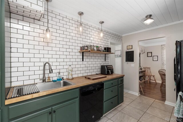 23385 Hunters Ln, Southfield, MI 48033 - kitchen with black appliances, green cabinetry, butcher block counters, backsplash, and light tile patterned floors