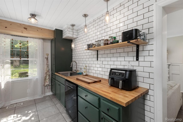 23385 Hunters Ln, Southfield, MI 48033 - kitchen with butcher block counters, green cabinets, black dishwasher, light tile patterned floors, and healthy amount of natural light