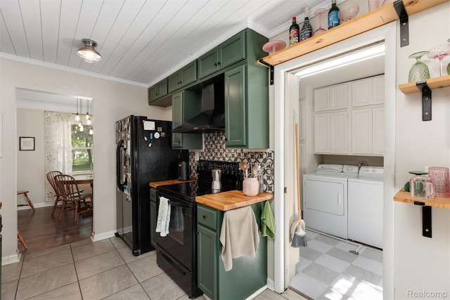 23385 Hunters Ln, Southfield, MI 48033 - kitchen with green cabinetry, black appliances, exhaust hood, washer and clothes dryer, and crown molding