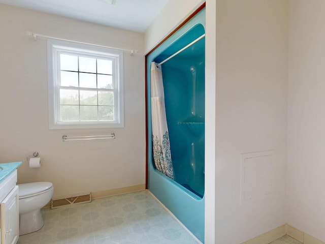12148 N Elms Rd, Clio, MI 48420 - full bath with vanity, toilet, baseboards, shower / bath combination with curtain, and tile patterned floors
