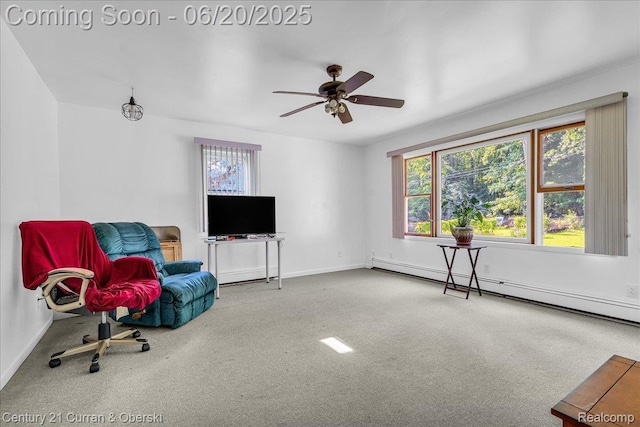24121 Kraft Pl, Brownstown, MI 48174 - unfurnished room featuring baseboard heating, carpet floors, plenty of natural light, and ceiling fan