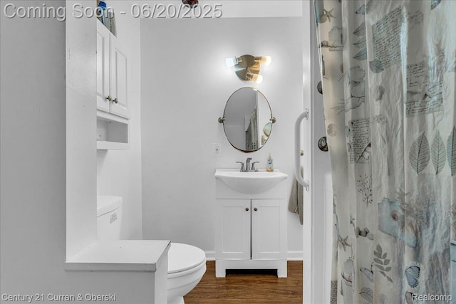 24121 Kraft Pl, Brownstown, MI 48174 - full bath featuring vanity, wood finished floors, and a shower with curtain