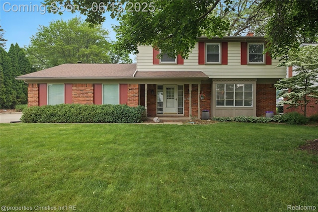 6821 Tamerlane Dr, West Bloomfield, MI 48322 - traditional home featuring brick siding, a front yard, and a chimney