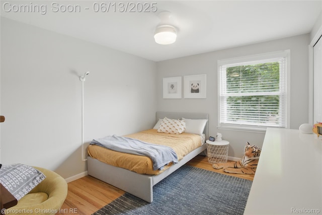 6821 Tamerlane Dr, West Bloomfield, MI 48322 - bedroom featuring wood finished floors