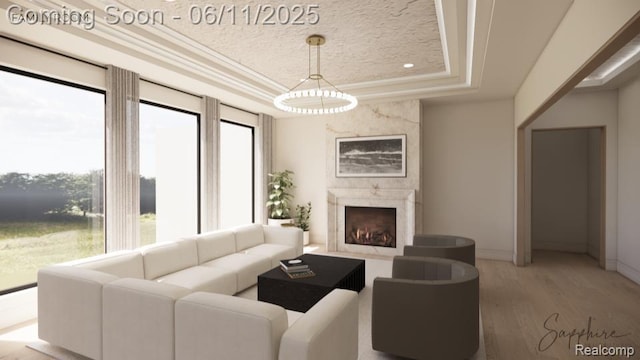 1573 Chesterfield Rnch, Bloomfield Hills, MI 48009 - living room with a tray ceiling, plenty of natural light, wood finished floors, and a high end fireplace