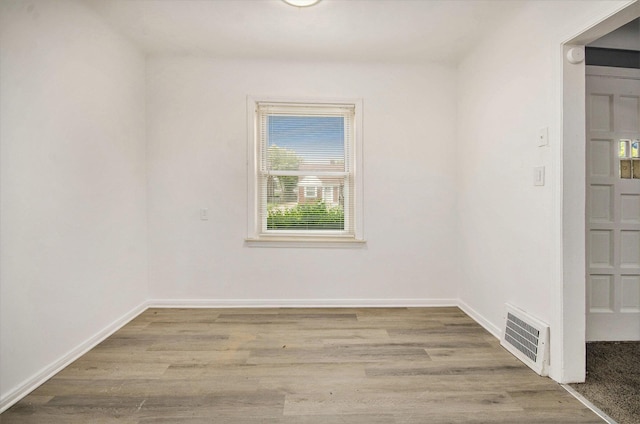 16086 Carlisle St, Detroit, MI 48205 - spare room with wood finished floors and baseboards