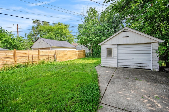 16086 Carlisle St, Detroit, MI 48205 - detached garage with concrete driveway