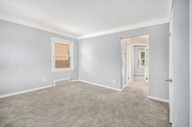 16086 Carlisle St, Detroit, MI 48205 - carpeted spare room featuring baseboards