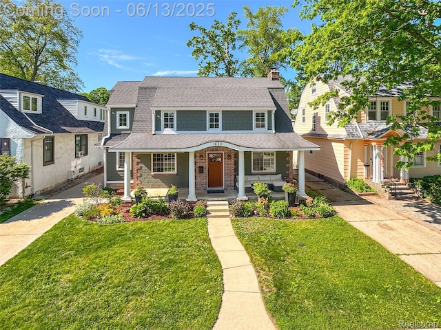 1630 W Houstonia Ave, Royal Oak, MI 48073 - view of front of house with a porch, roof with shingles, driveway, a chimney, and a front lawn