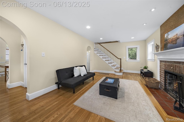 1630 W Houstonia Ave, Royal Oak, MI 48073 - living area featuring arched walkways, wood finished floors, baseboards, and recessed lighting