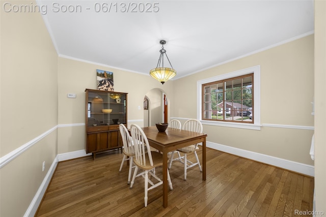 1630 W Houstonia Ave, Royal Oak, MI 48073 - dining space featuring arched walkways, wood finished floors, crown molding, and baseboards