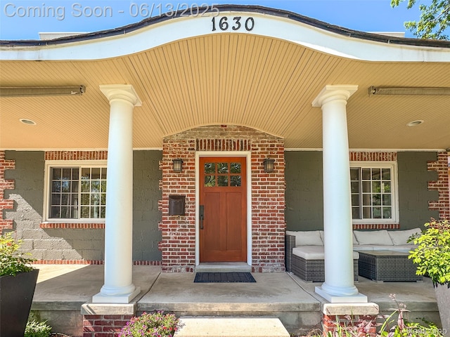 1630 W Houstonia Ave, Royal Oak, MI 48073 - entrance to property featuring covered porch and brick siding