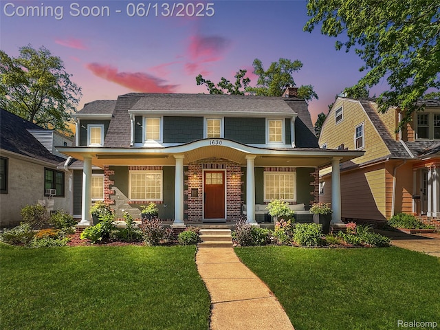 1630 W Houstonia Ave, Royal Oak, MI 48073 - view of front of home featuring covered porch, a yard, and a chimney