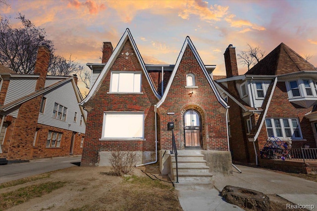 16558 Indiana St, Detroit, MI 48221 - english style home featuring brick siding and a chimney
