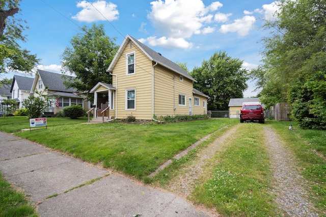 1704 Pringle Ave, Jackson, MI 49203 - view of front facade with driveway