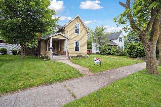 1704 Pringle Ave, Jackson, MI 49203 - view of front of home with covered porch