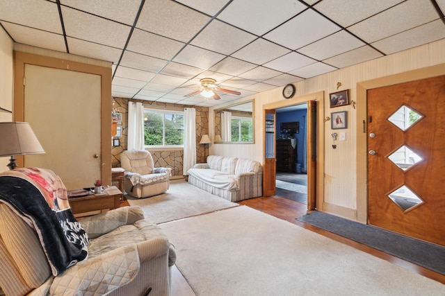 1704 Pringle Ave, Jackson, MI 49203 - living area with a paneled ceiling, a ceiling fan, and carpet floors
