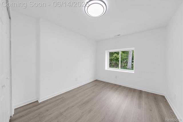 2694 Vendome Ave, Rochester Hills, MI 48309 - spare room with wood finished floors and baseboards